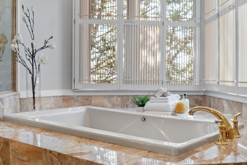 3 Goodwin Road Lexington, MA 02420 - Photo 24 of 38 a bathroom with a tub and sink