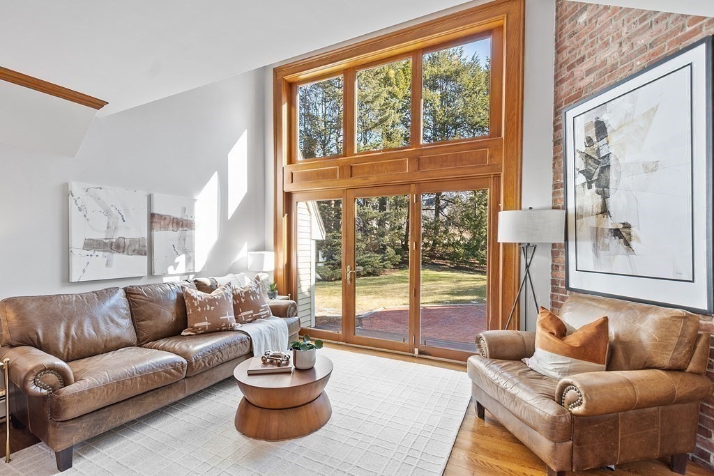 3 Goodwin Road Lexington, MA 02420 - Photo 4 of 38 a living room with furniture and a large window