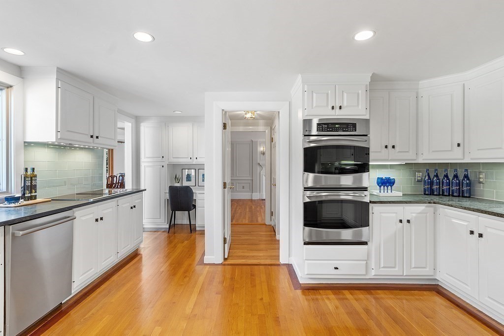 3 Goodwin Road Lexington, MA 02420 - Photo 10 of 38 a kitchen with stainless steel appliances a stove a sink and a refrigerator