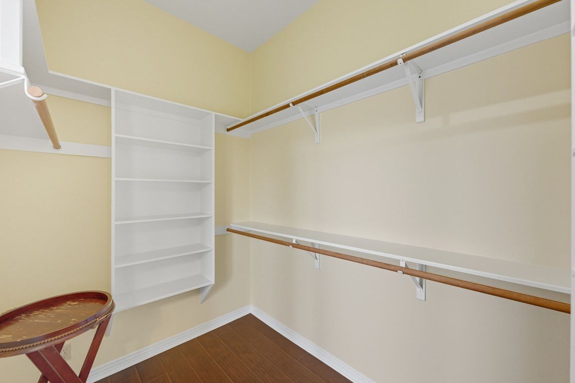 1101 Oak Hurst Road, Unit 100 Austin, TX 78734 - Photo 19 of 35 a view of walk in closet with empty racks