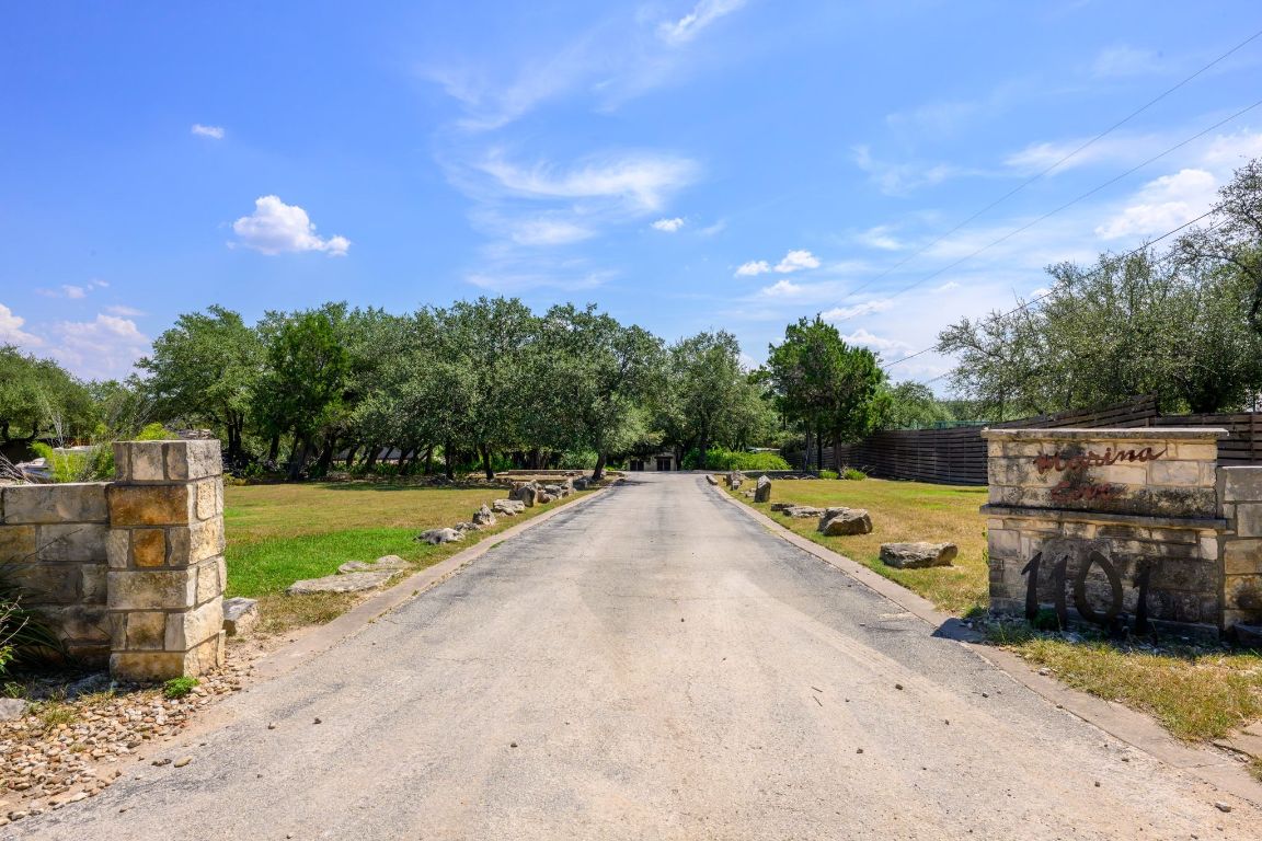 1101 Oak Hurst Road, Unit 100 Austin, TX 78734 - Photo 26 of 35 a view of a swimming pool with a yard