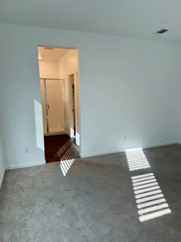 a bathroom with a double vanity sink a and mirror