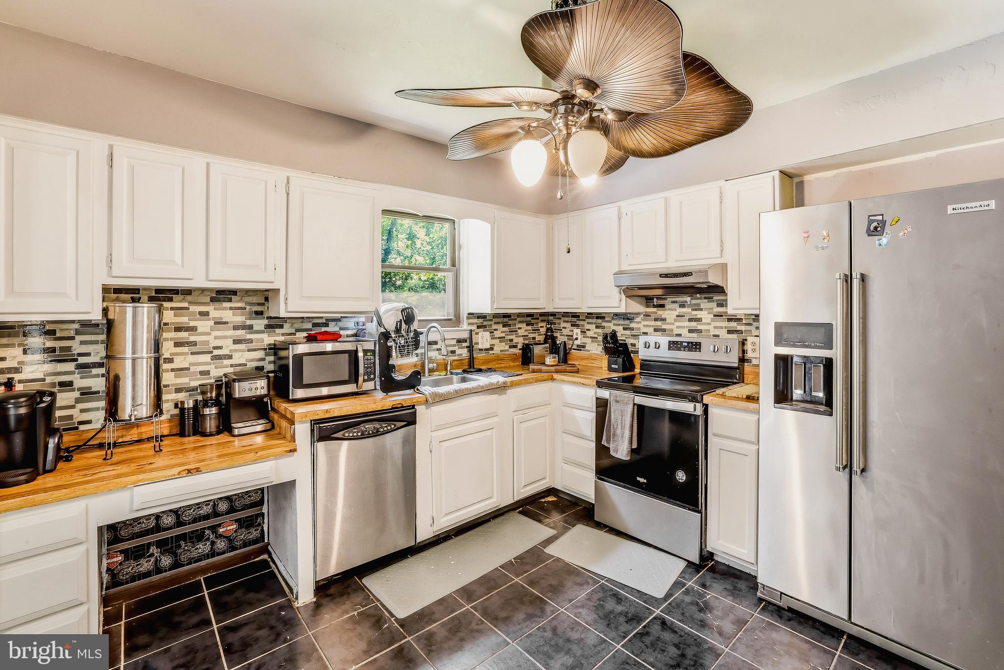 7 Matro Avenue Sicklerville, NJ 08081 - Photo 3 of 21 a kitchen with stainless steel appliances a stove a refrigerator and cabinets