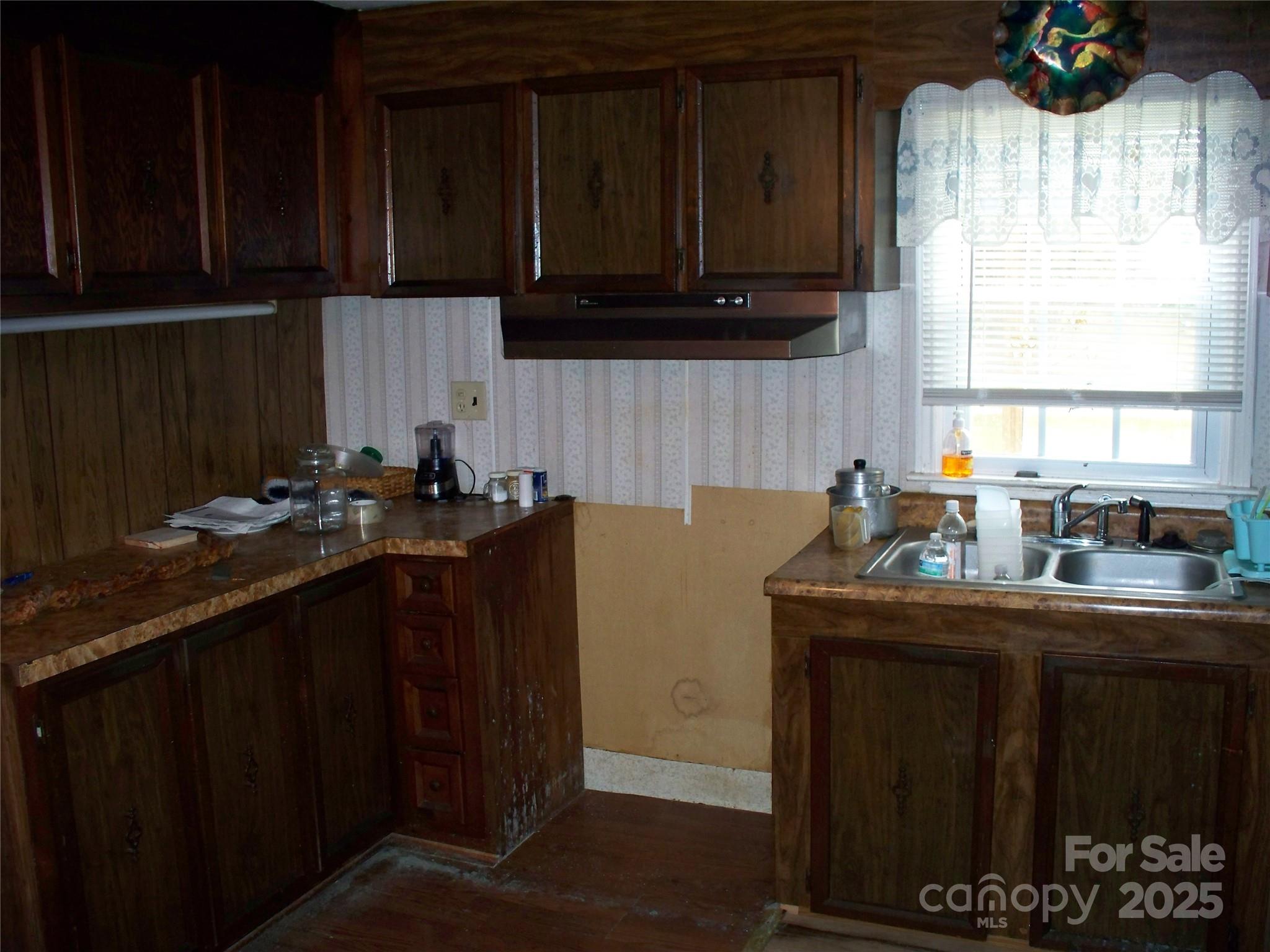914 Salem Church Road Lincolnton, NC 28092 - Photo 11 of 22 a kitchen with granite countertop a sink dishwasher a stove a refrigerator and cabinets with wooden floor
