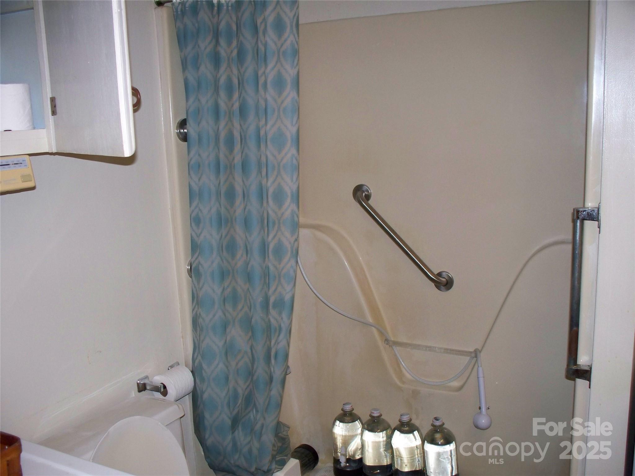 914 Salem Church Road Lincolnton, NC 28092 - Photo 15 of 22 a bathroom with a bathtub and a shower