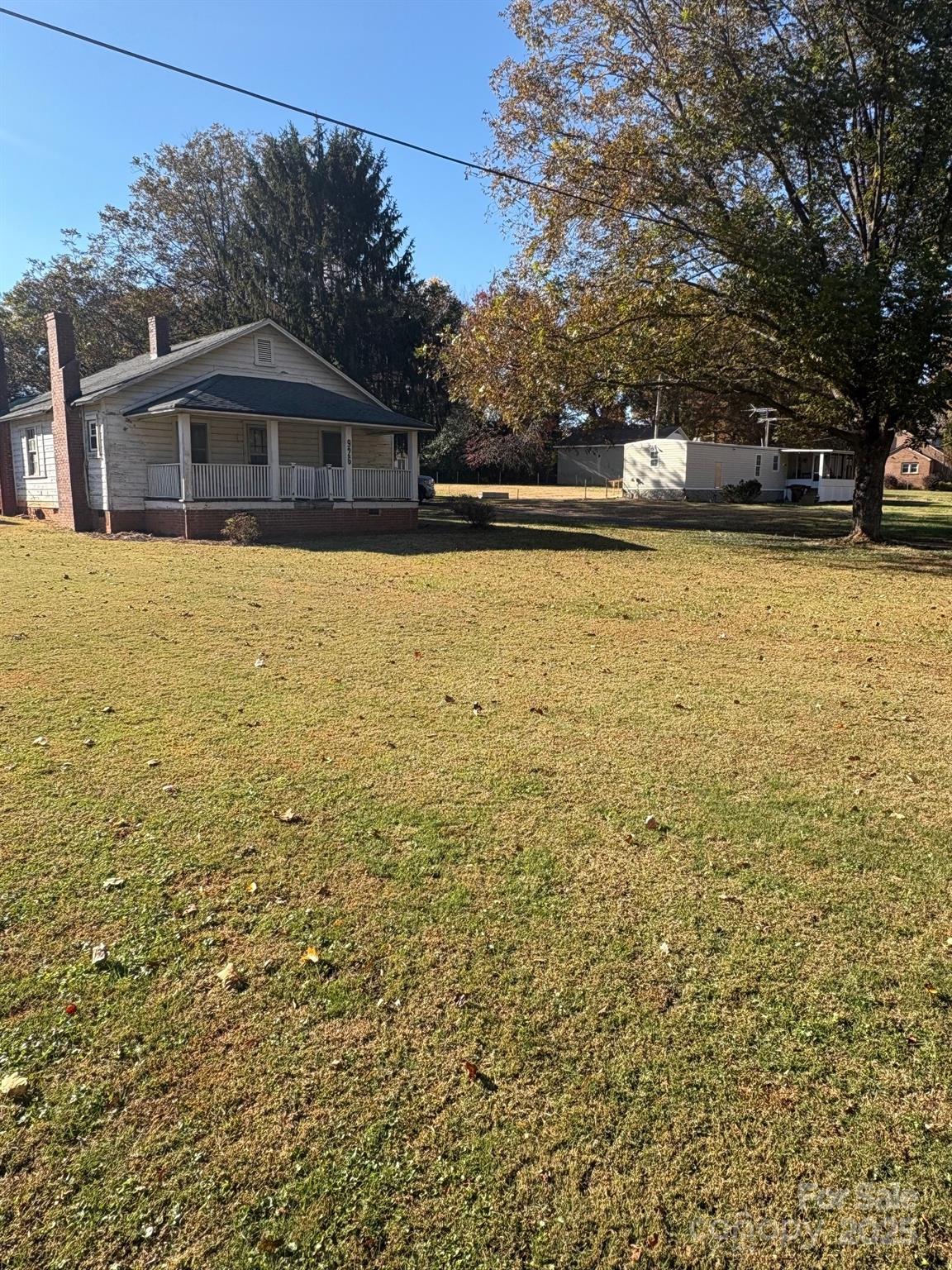 914 Salem Church Road Lincolnton, NC 28092 - Photo 22 of 22 a view of swimming pool with trees in the background