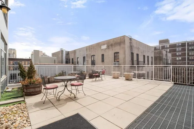a spacious bathroom with a double vanity sink and a mirror
