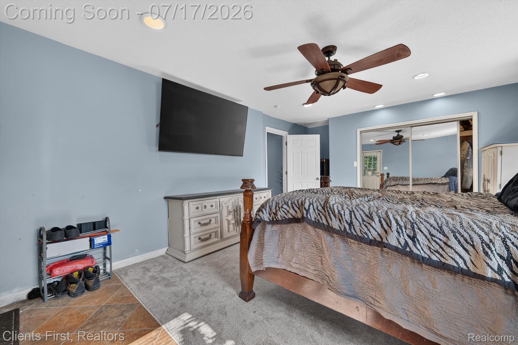 36852 Chase Street Romulus, MI 48174 - Photo 18 of 40 Bedroom featuring a ceiling fan with integrated lighting, recessed ceiling lighting, and a mirrored sliding closet door