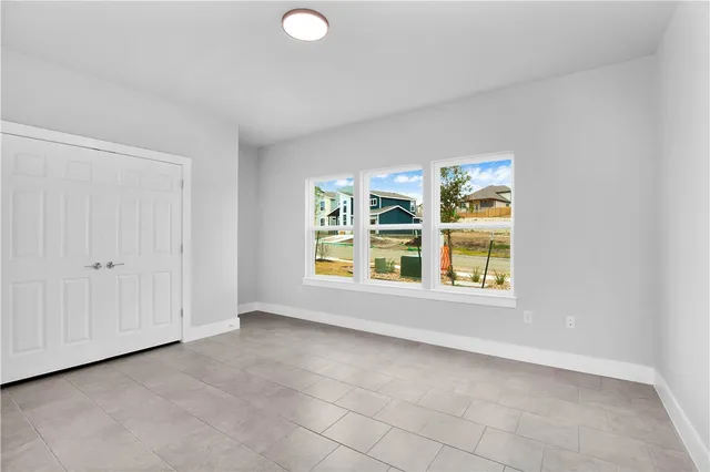 an empty room with windows