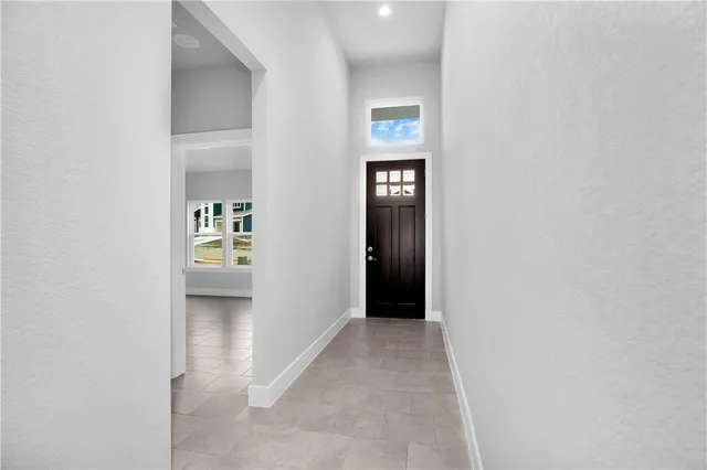 a view of a room that has a window in it