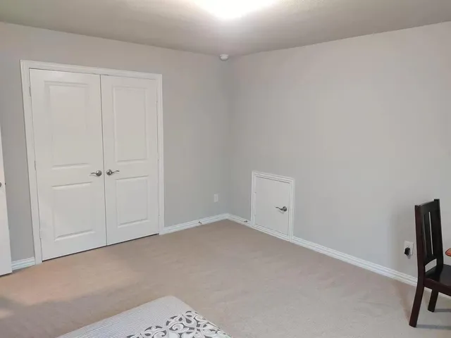 an empty room with a bench