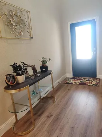 a bathroom with double vanity sinks and a mirror