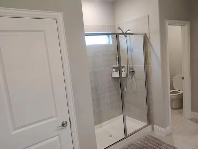 a bathroom with a shower curtain