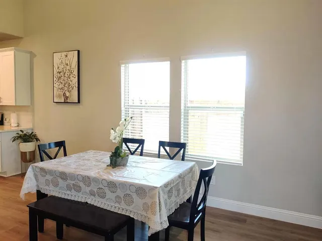 a dining room with table and chair