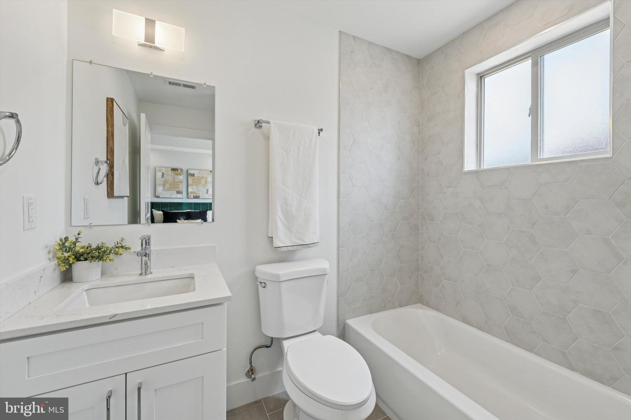 2401 North 2nd Street, Unit F3 Philadelphia, PA 19133 - Photo 12 of 26 a bathroom with a sink toilet and shower