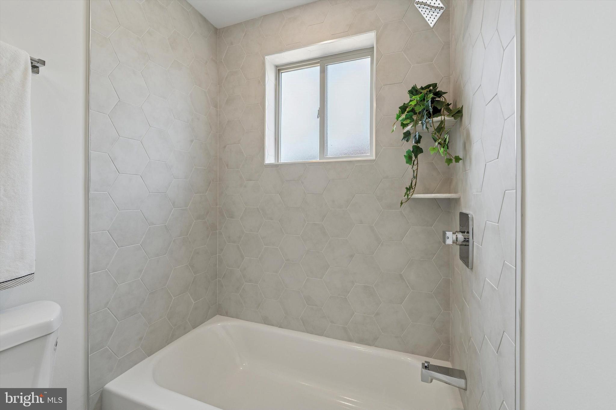 2401 North 2nd Street, Unit F3 Philadelphia, PA 19133 - Photo 4 of 26 a bath room with a toilet and a shower