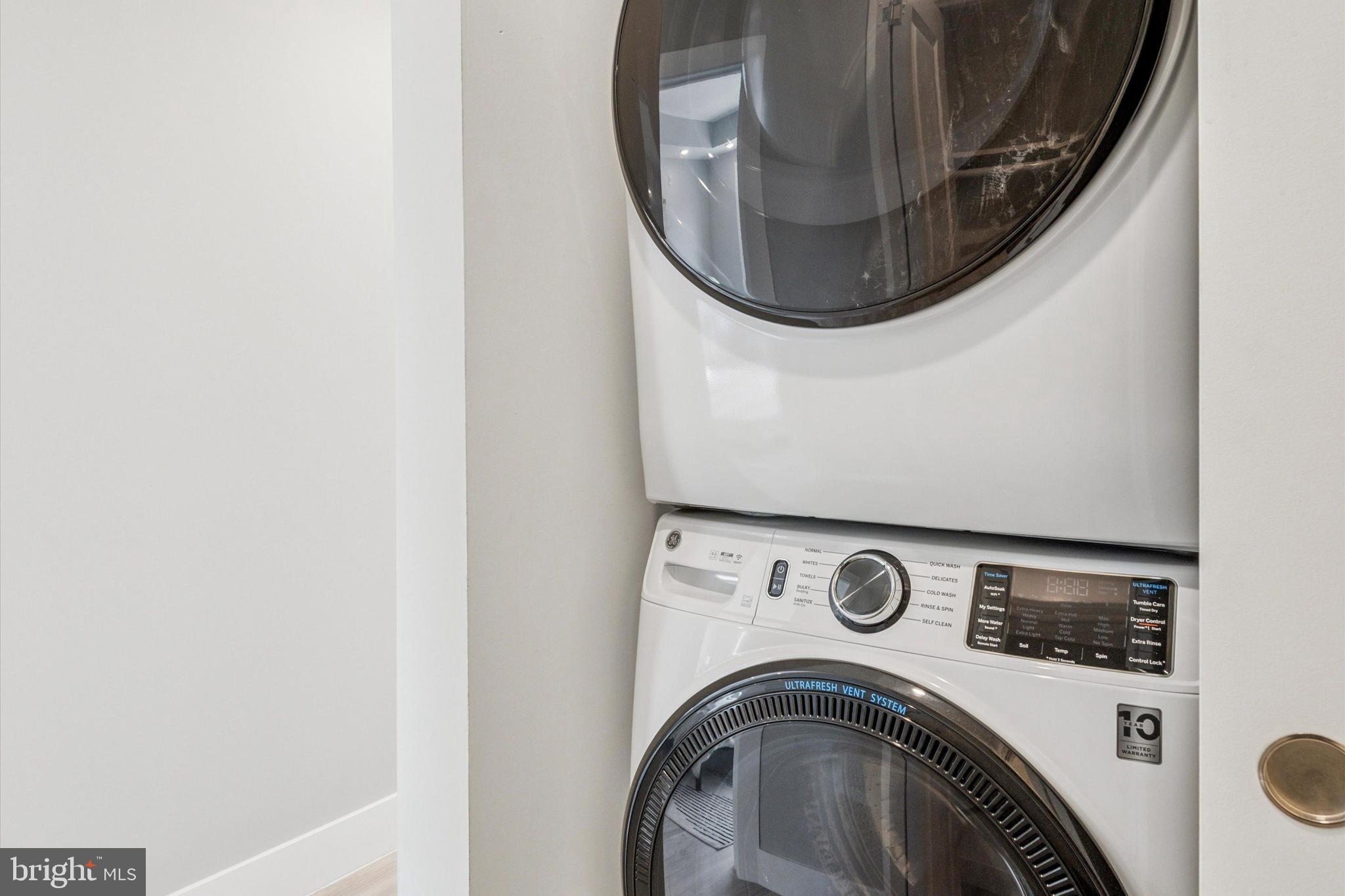 2401 North 2nd Street, Unit F3 Philadelphia, PA 19133 - Photo 7 of 26 a utility room with dryer and washer