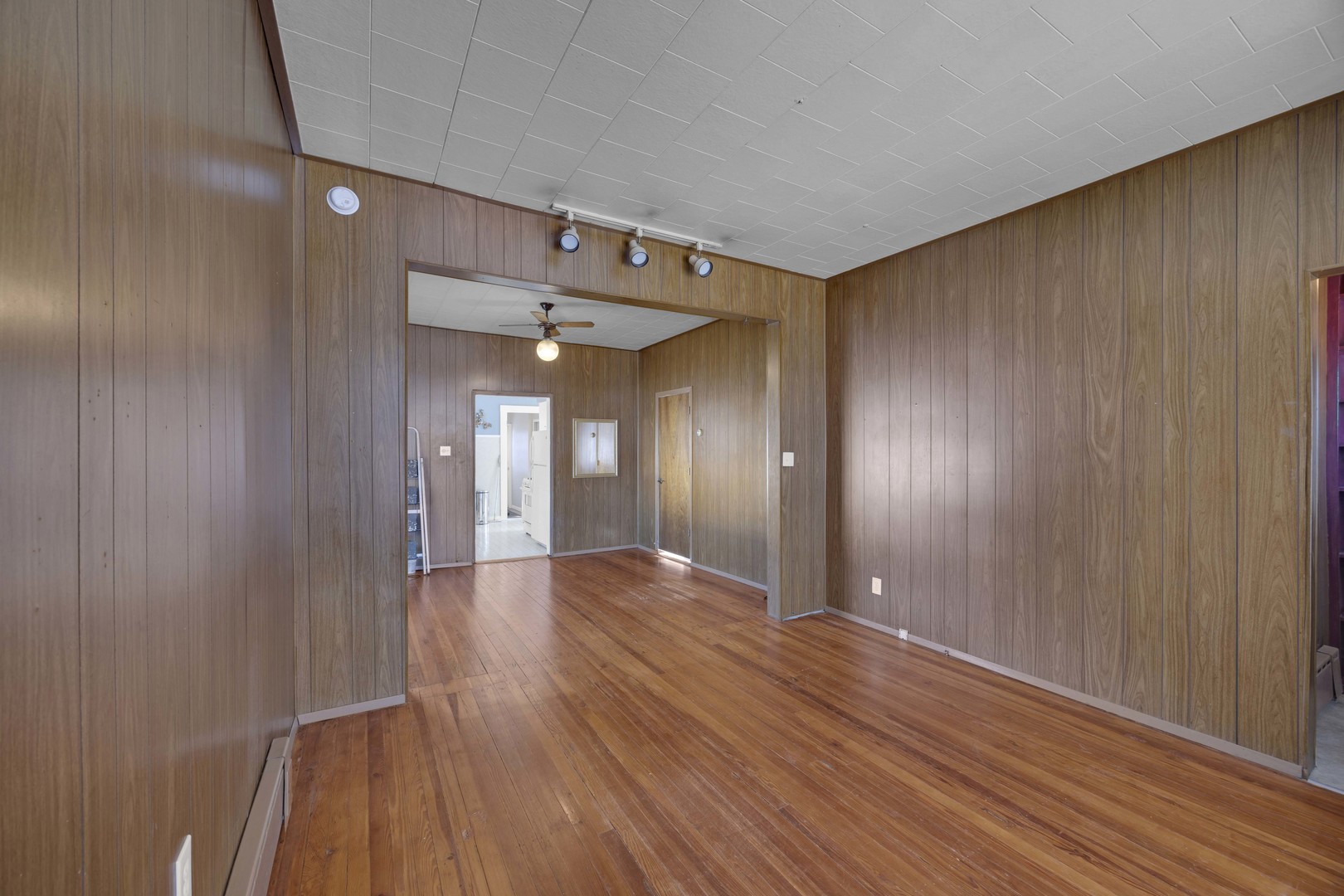 3333 Union Avenue Steger, IL 60475 - Photo 15 of 31 a view of a hallway with wooden floor
