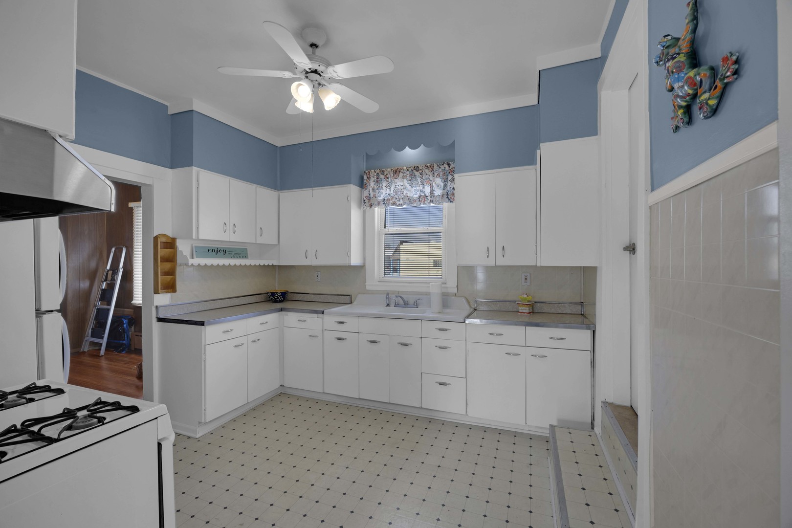 3333 Union Avenue Steger, IL 60475 - Photo 20 of 31 a kitchen with a sink cabinets and stainless steel appliances