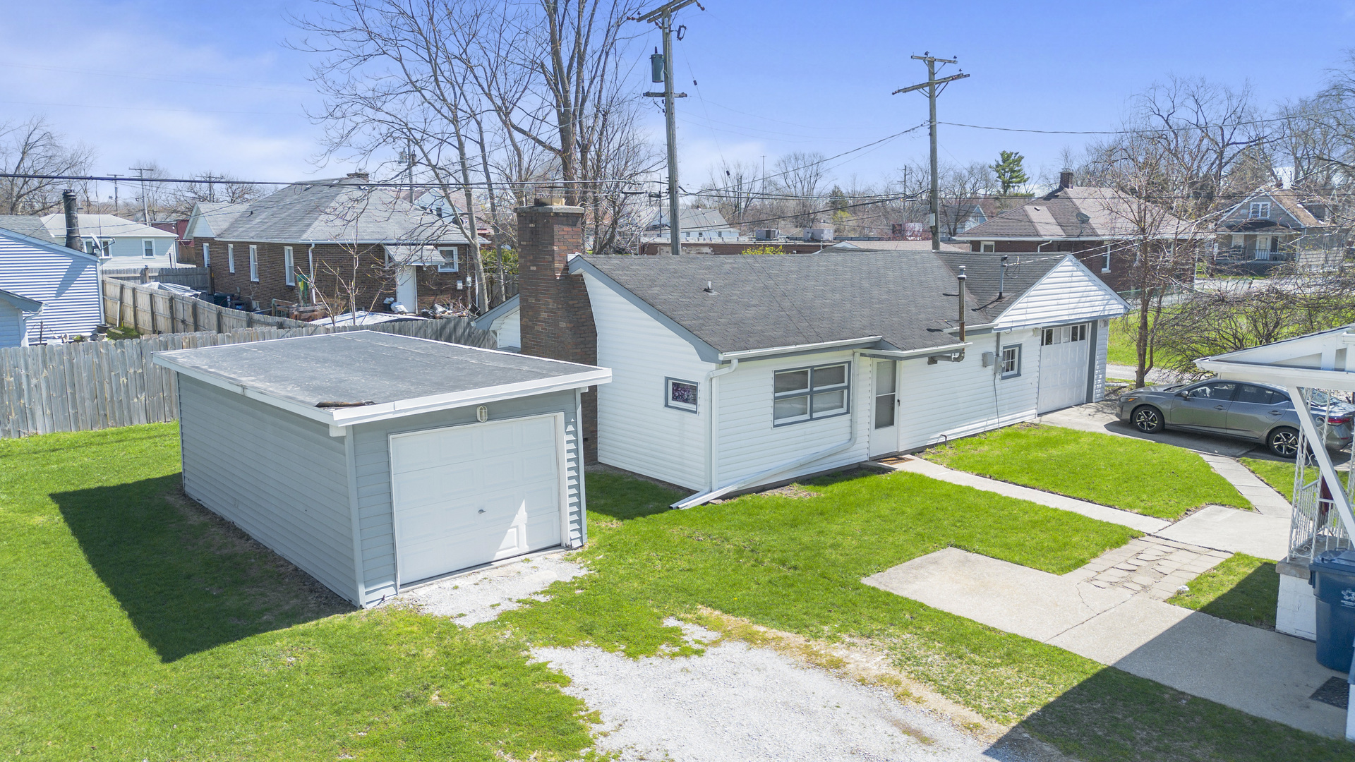 3333 Union Avenue Steger, IL 60475 - Photo 2 of 31 a view of a house with a backyard and a patio