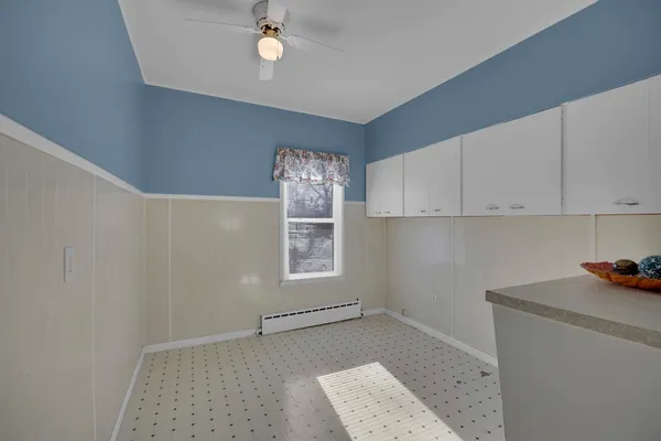 a kitchen with stainless steel appliances a sink stove and refrigerator
