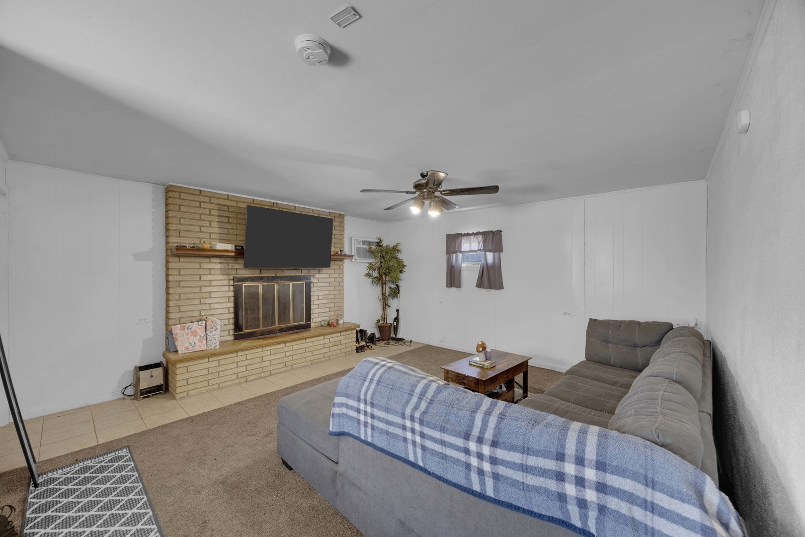 3333 Union Avenue Steger, IL 60475 - Photo 7 of 31 a living room with furniture and a flat screen tv