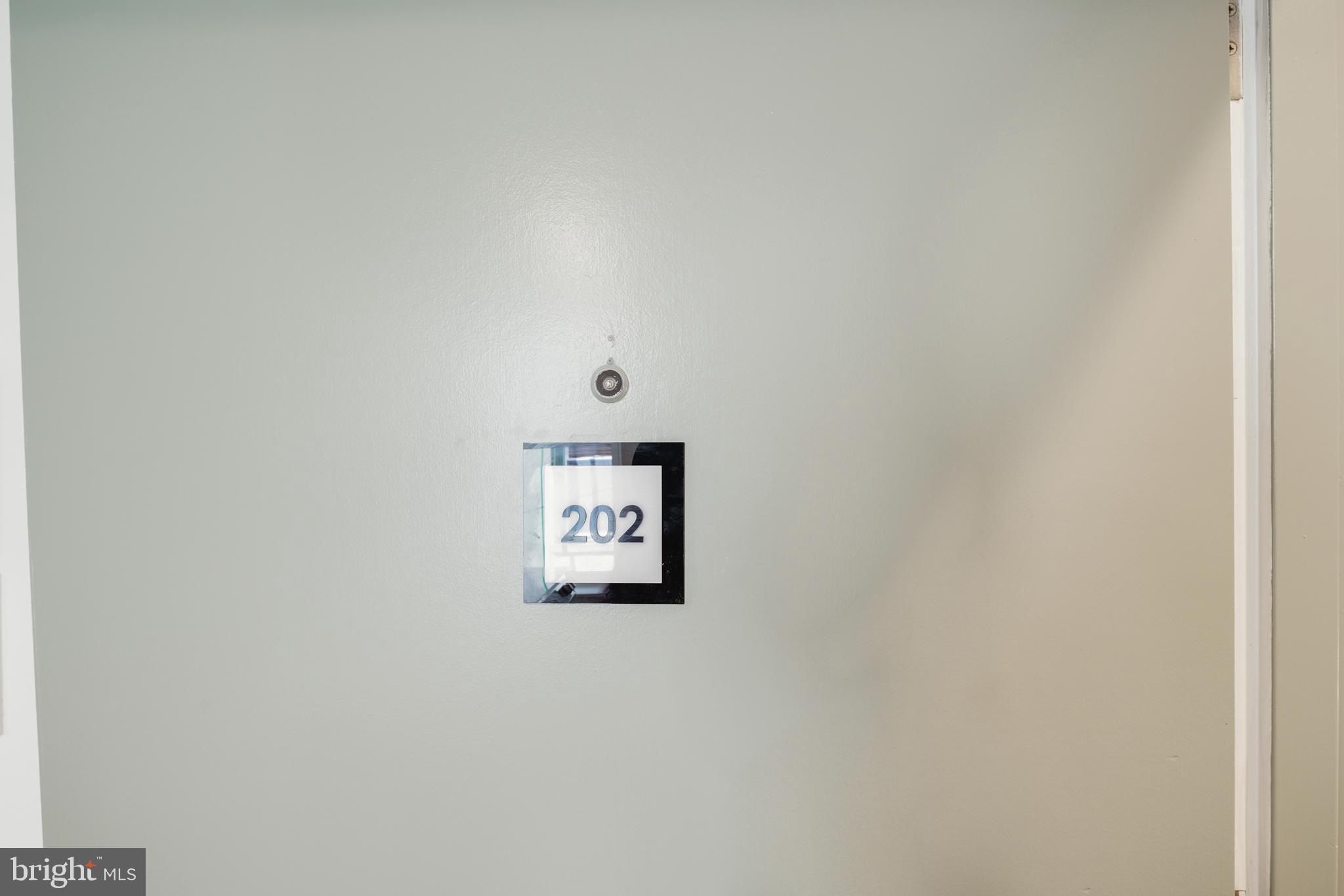 1716 Wallace Street, Unit 202 Philadelphia, PA 19130 - Photo 2 of 12 a wall with a painting on it