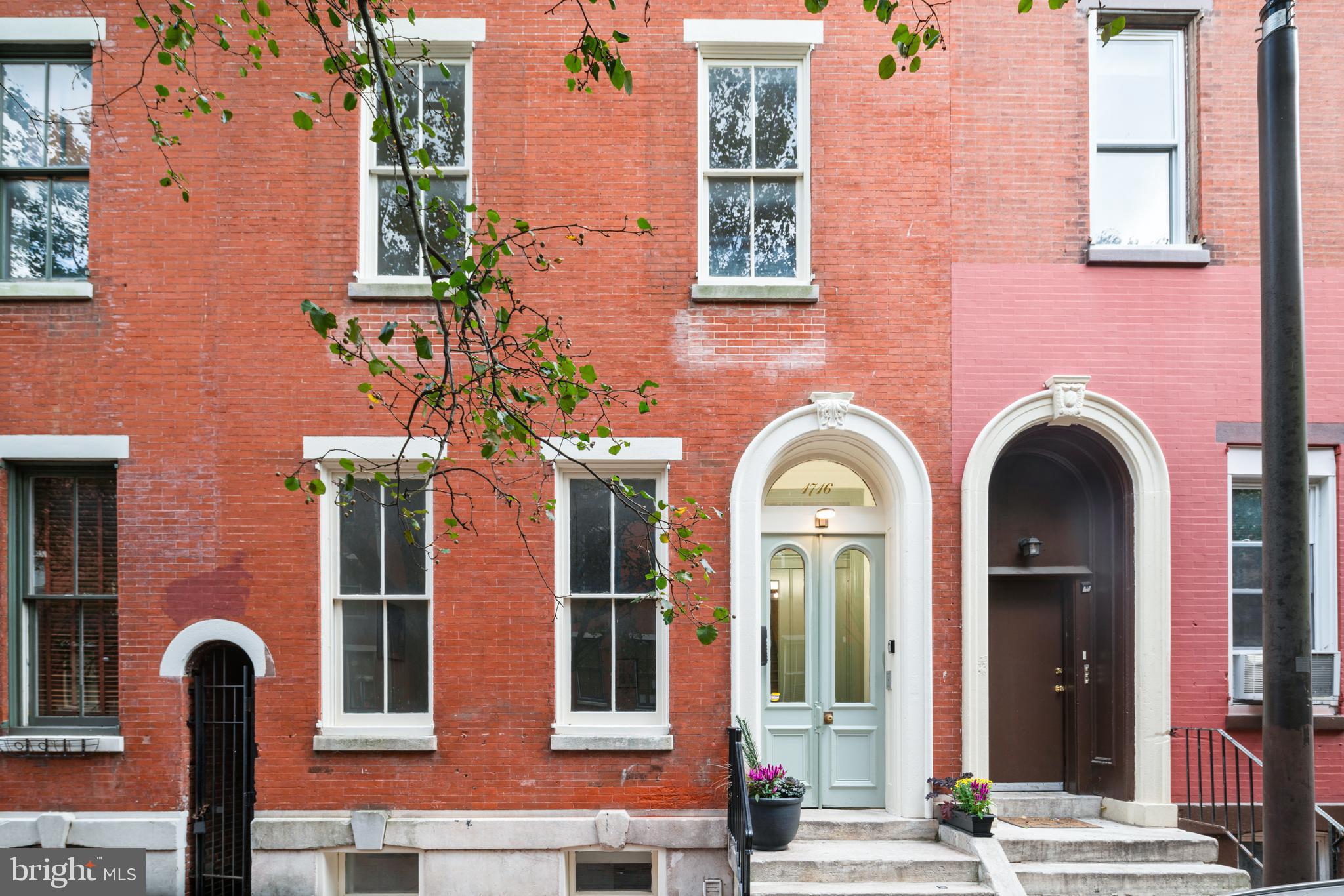 1716 Wallace Street, Unit 202 Philadelphia, PA 19130 - Photo 11 of 12 a front view of a multi story residential apartment building