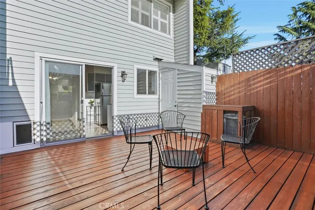 a balcony view with a seating space