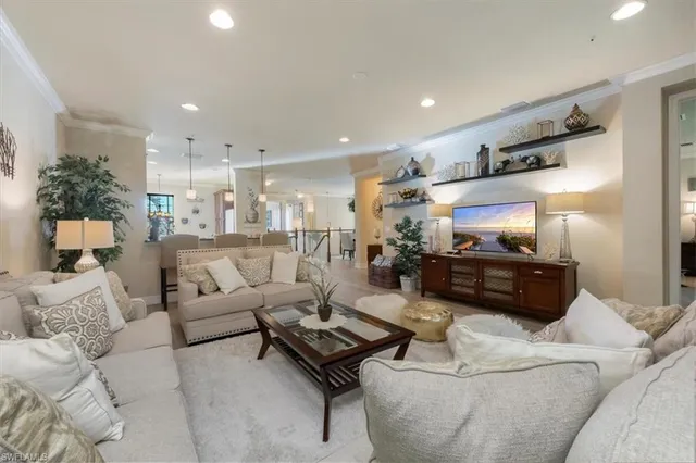 a living room with furniture and a table