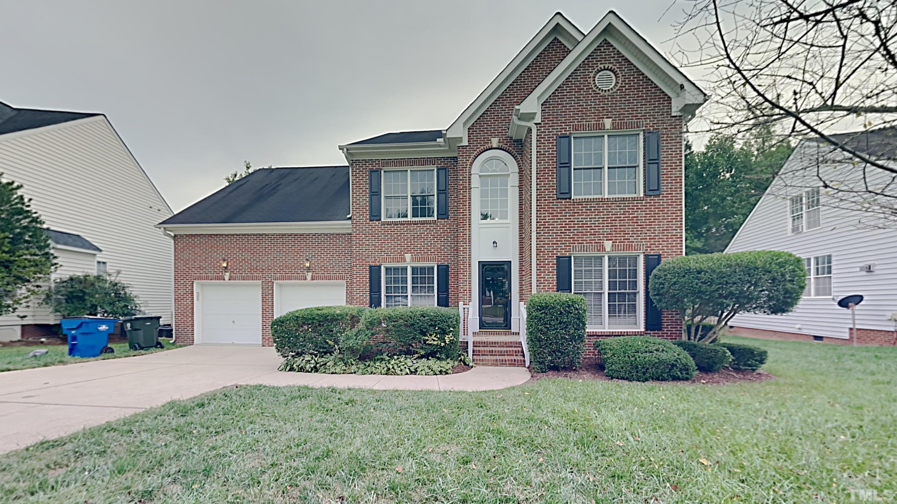 5020 Amberfield Way Raleigh, NC 27604 - Photo 1 of 24 a front view of a house with a yard