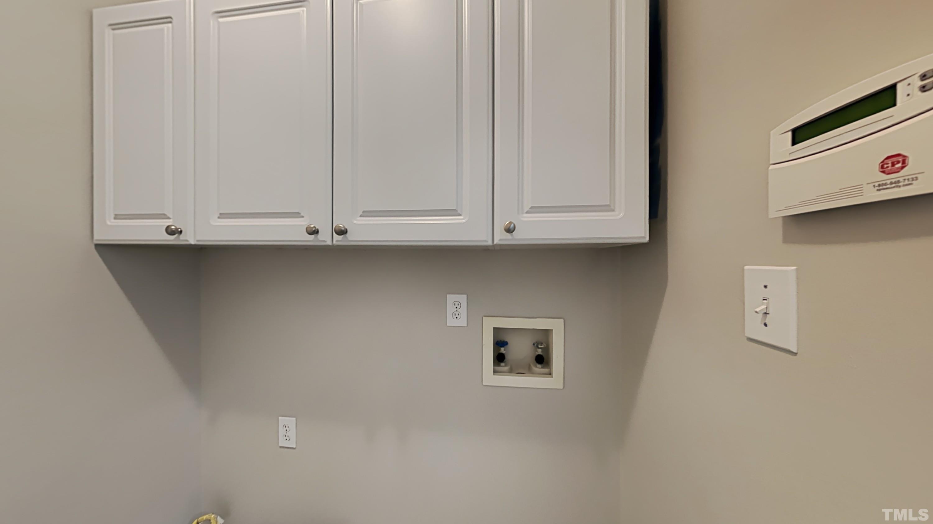 5020 Amberfield Way Raleigh, NC 27604 - Photo 12 of 24 a view of kitchen with white cabinets
