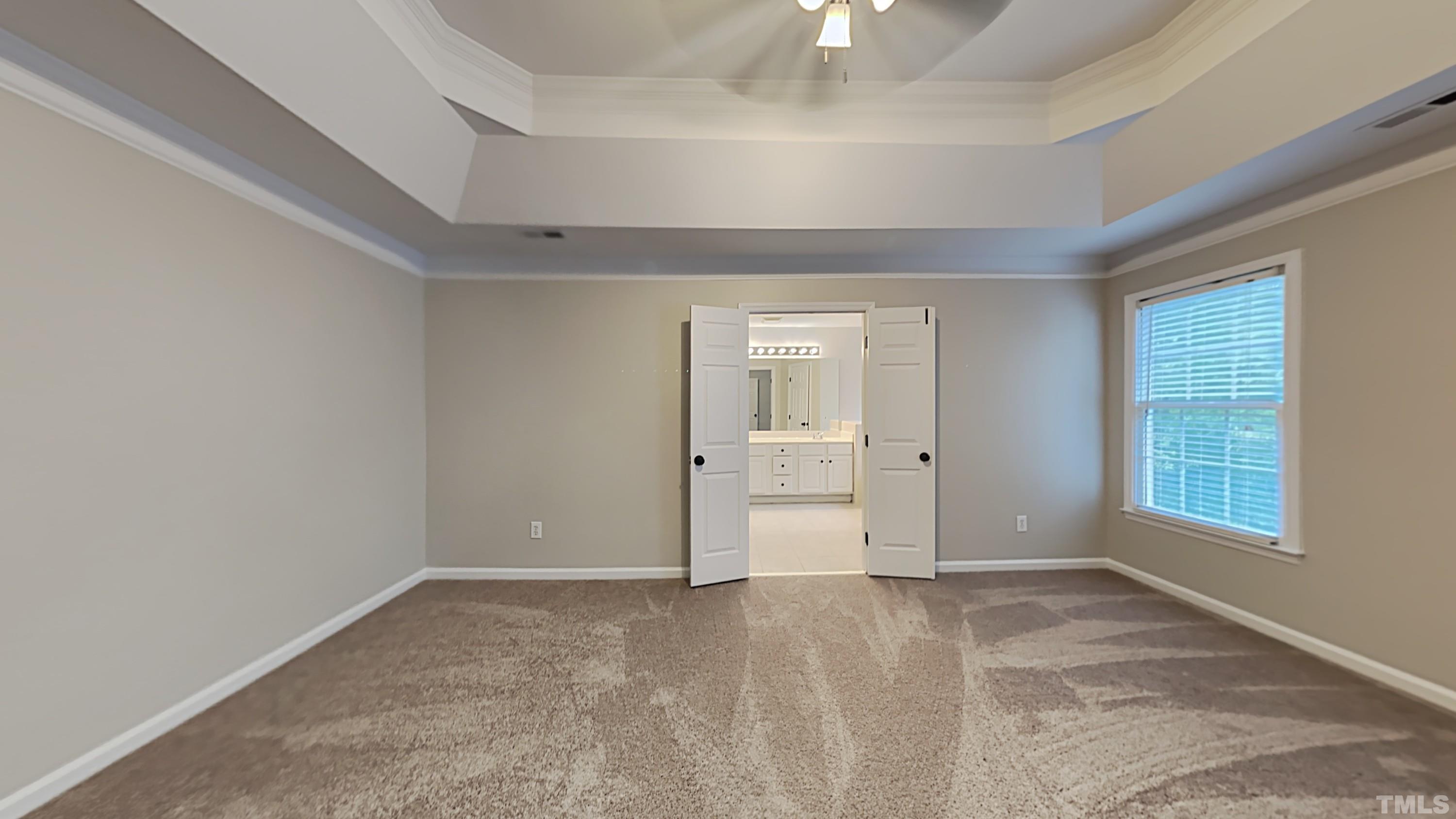 5020 Amberfield Way Raleigh, NC 27604 - Photo 13 of 24 an empty room with windows and closet