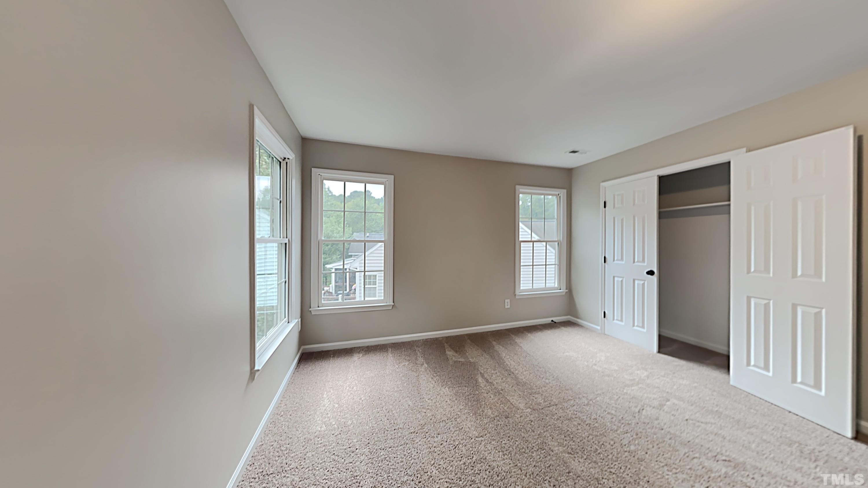 5020 Amberfield Way Raleigh, NC 27604 - Photo 19 of 24 a view of an empty room with a window