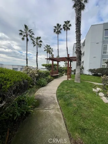 a living room with furniture and white walls
