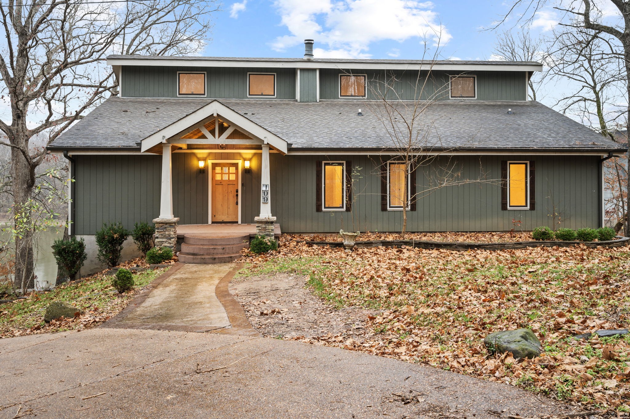 a front view of a house with a yard