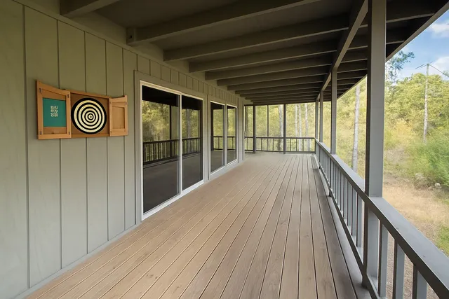 a view of porch with wooden floor