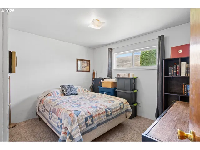a bathroom with a toilet sink and a mirror