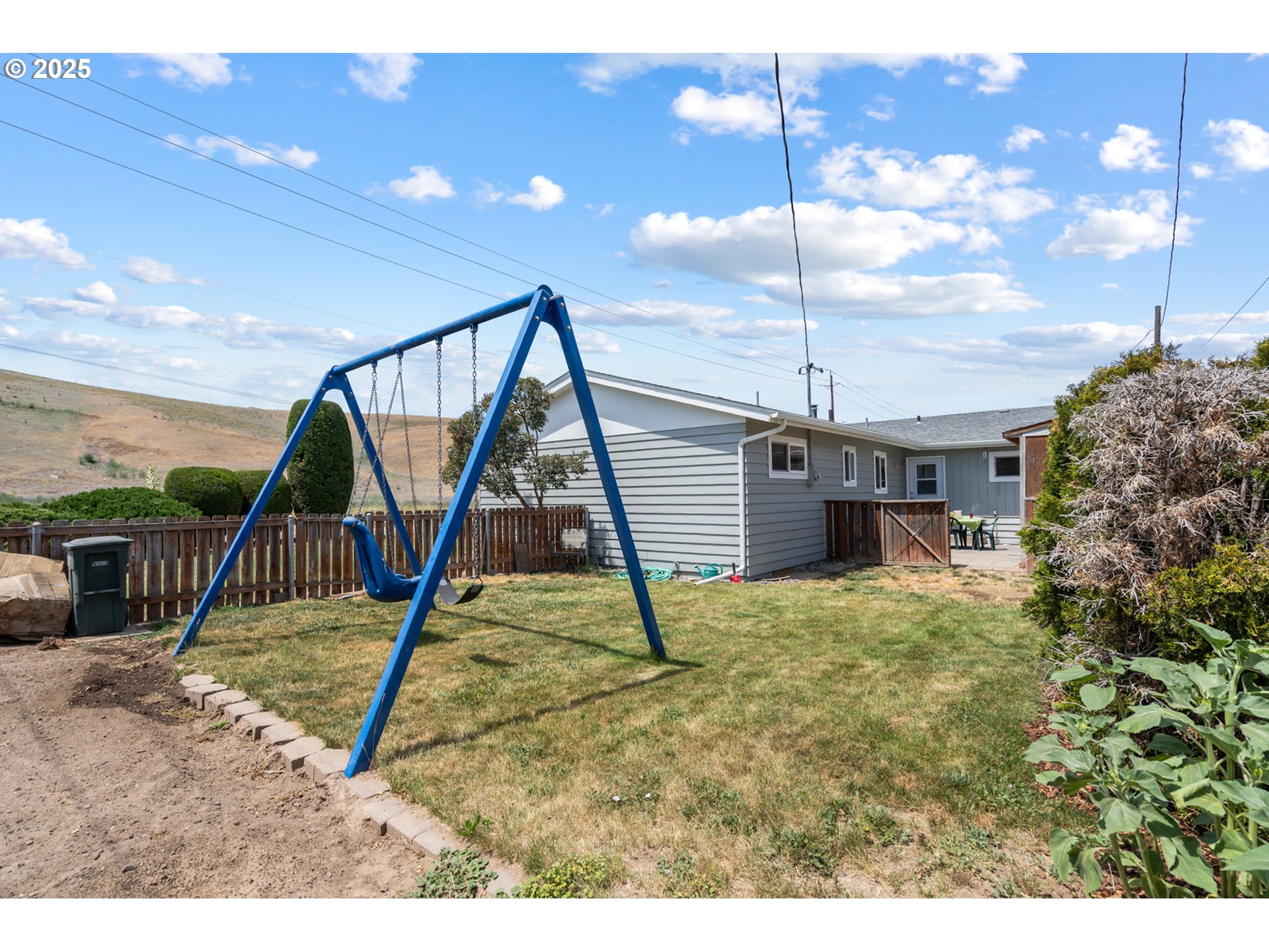 814 Southwest 44th Street Pendleton, OR 97801 - Photo 32 of 35 a view of a house with a backyard
