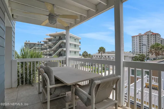 a bathroom with a granite countertop double vanity sink and a mirror