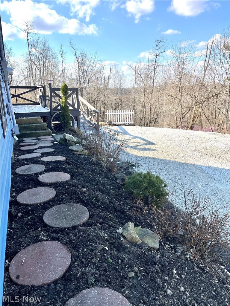 12972 Gilmore Road Southeast Port Washington, OH 43837 - Photo 38 of 50 View of yard featuring a wooden deck