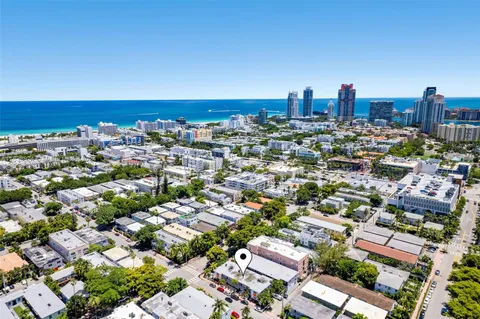 an aerial view of a city with lots of residential buildings