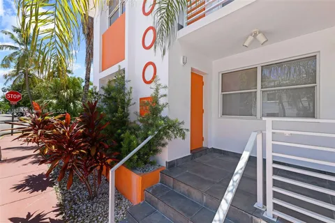 a view of a balcony with car parked