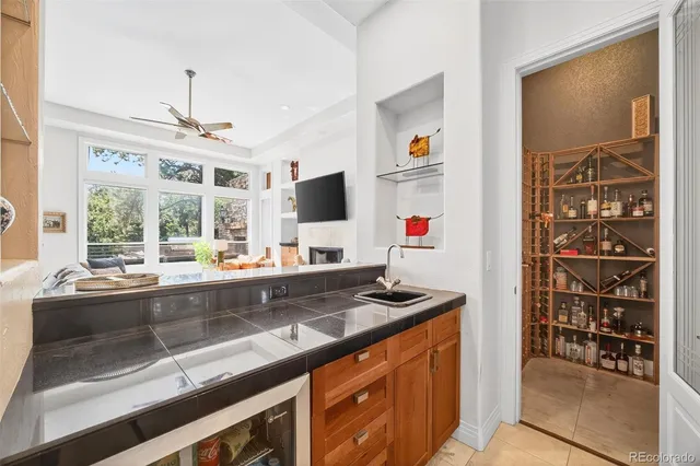 a kitchen with stainless steel appliances a sink and a stove