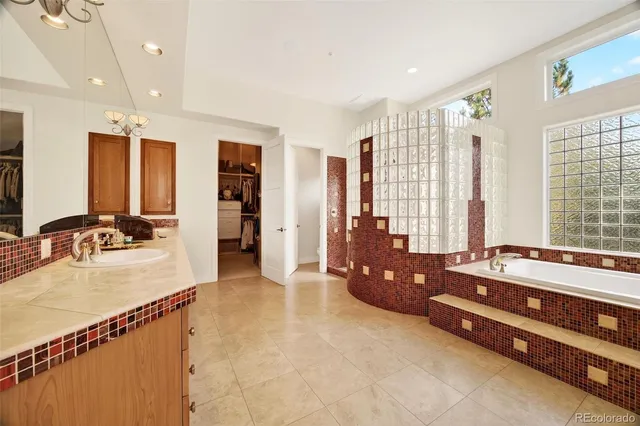 a bed room with a bed and a window