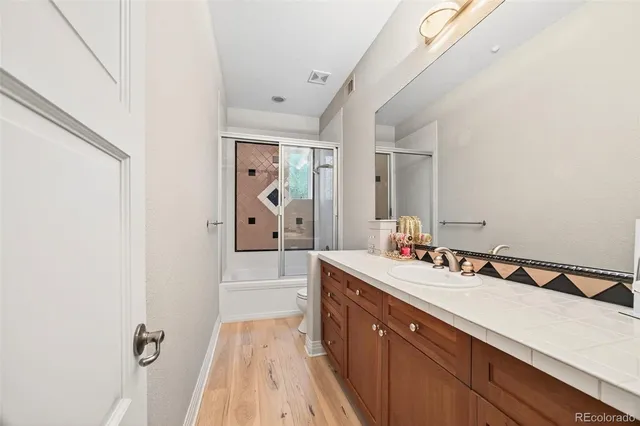 a bed room with a bed and a large window