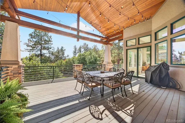 front view of a house with a tree