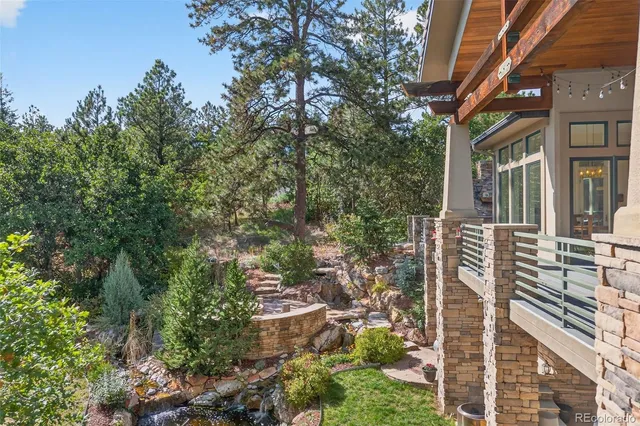 an aerial view of a house with yard
