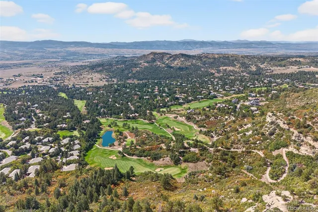 a picture of a bench in front of a window