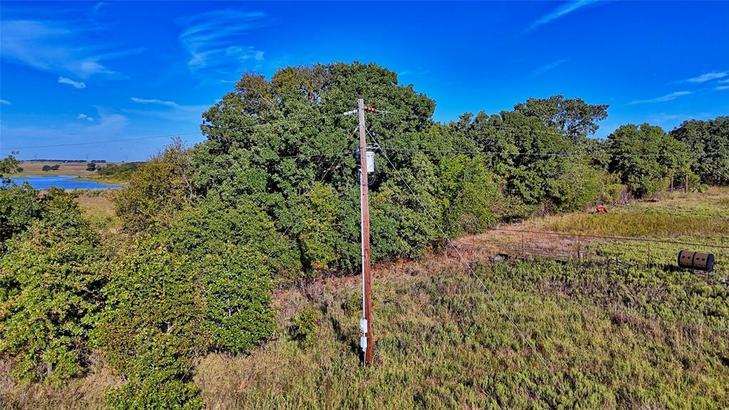 4 4 Wire Road Bowie, TX 76230 - Photo 31 of 39 a view of a field with a tree